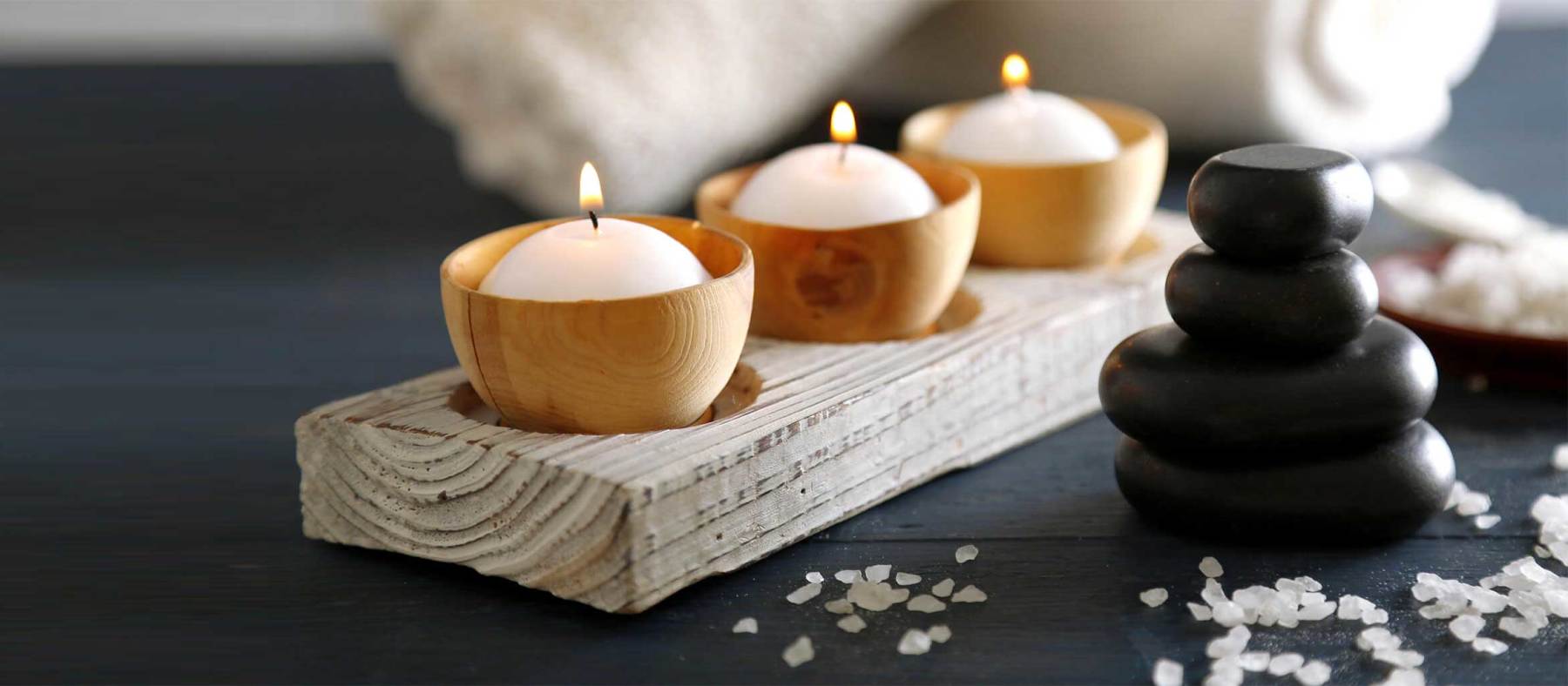 stacked rocks and candles at spavia day spa