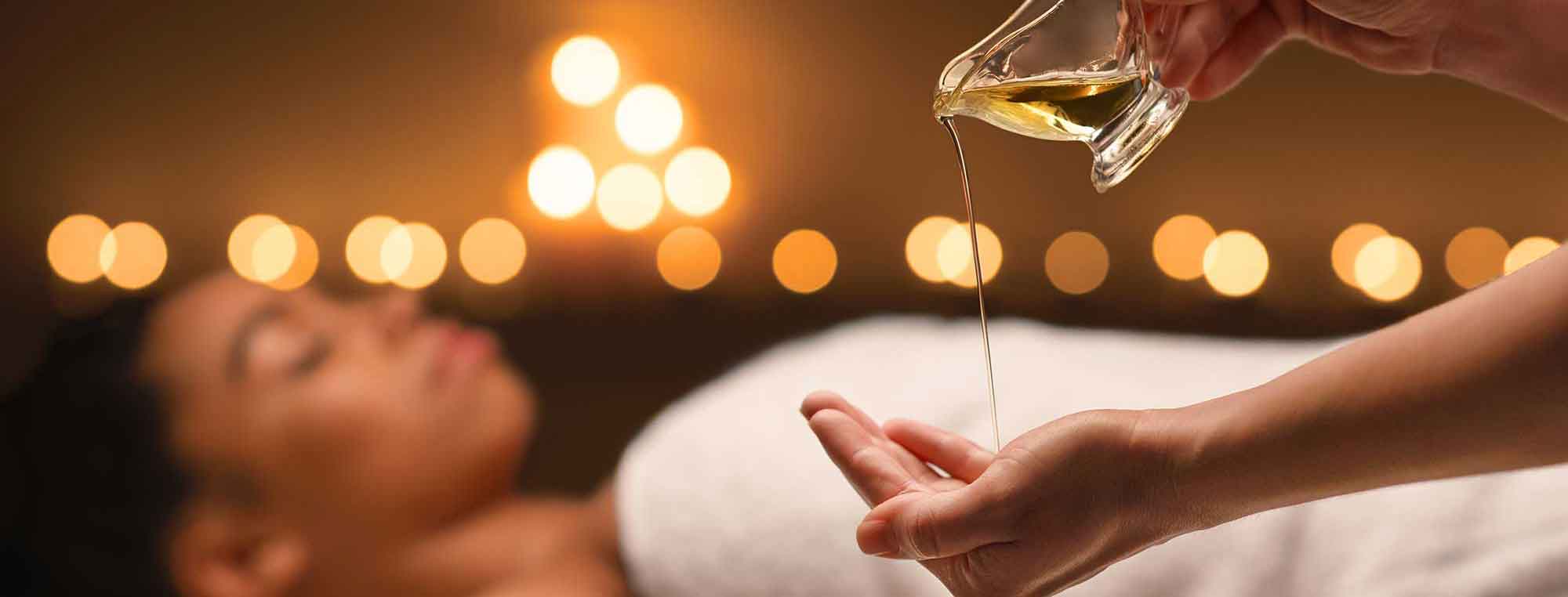 massage-oil-pouring