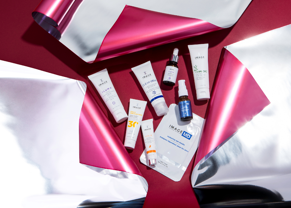 a group of beauty products on wrapping paper