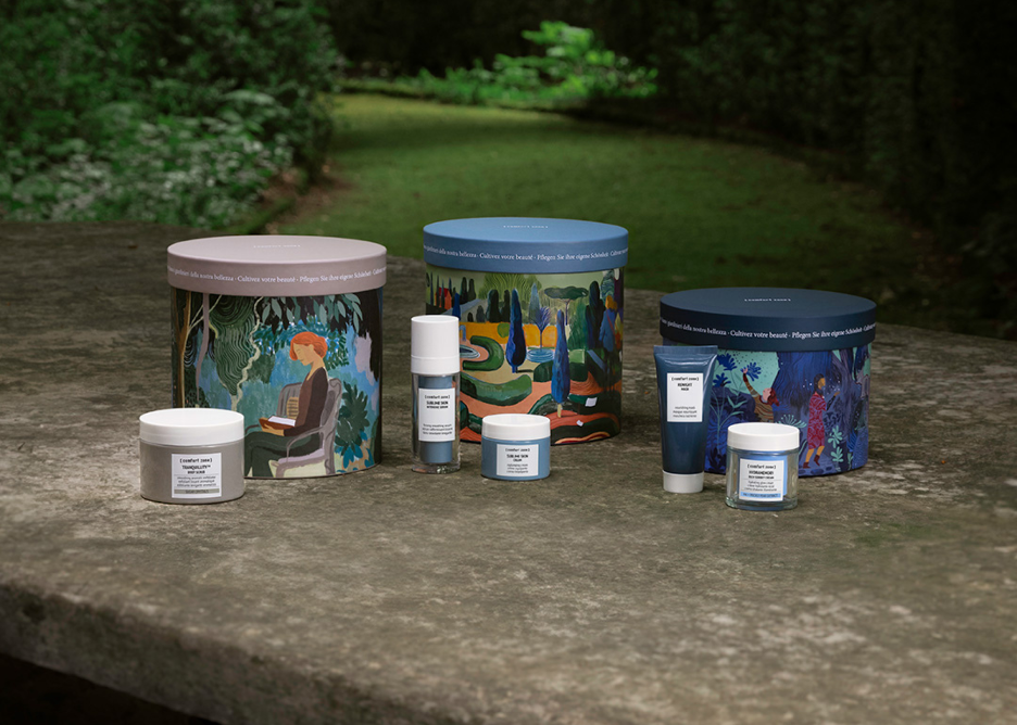 group of containers with skin care products on a stone surface